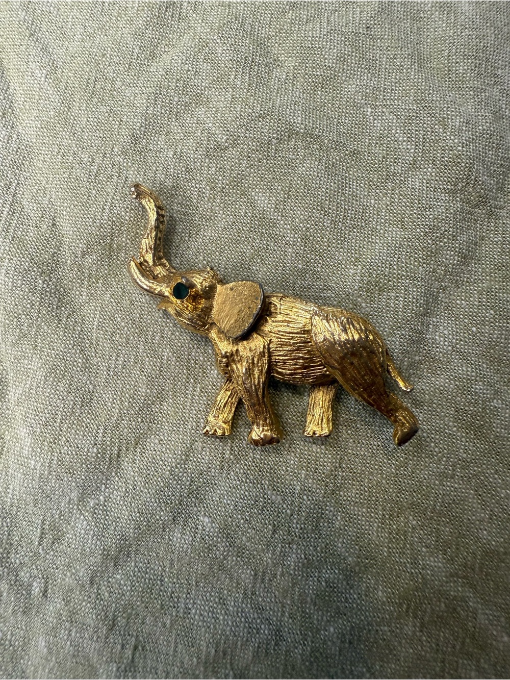 Vintage Gold Elephant Brooch with Green Eye